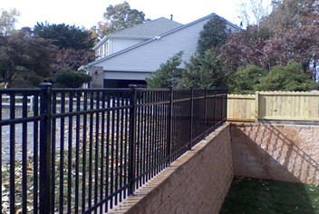 Using Aluminum Fence And Wood Fence in the same property