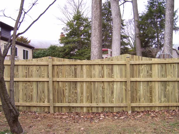 Flat board fence with 6 inch dip - face nailed (Inside View)