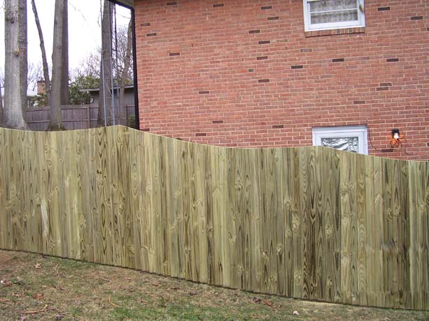 Flat board fence with 6 inch dip - face nailed (Outside View)